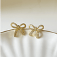 Dazzling Bow Crystal Detail Gold Plated Stud Earrings - Silks & Jewels