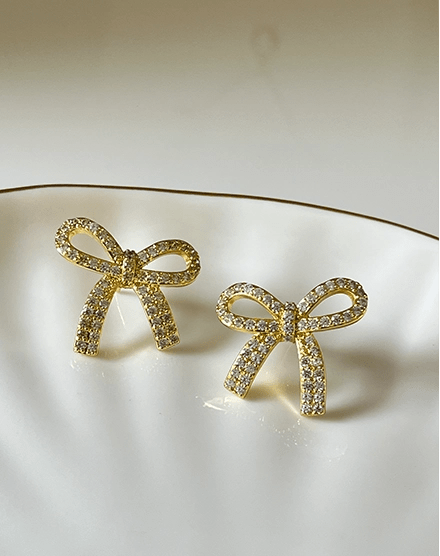 Dazzling Bow Crystal Detail Gold Plated Stud Earrings - Silks & Jewels
